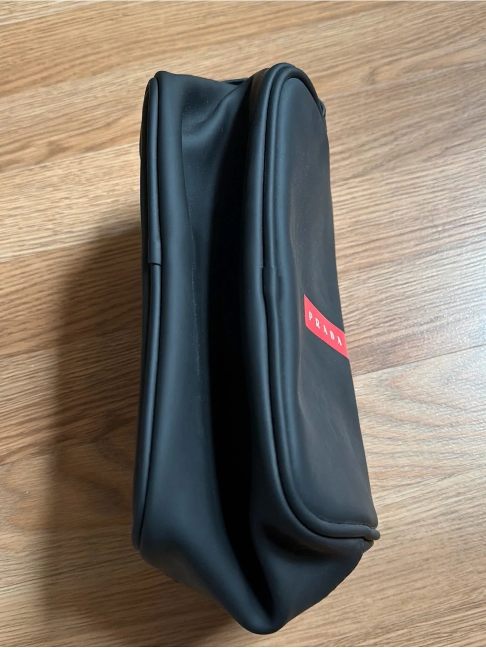 Prada Black Toiletry Pouch with Red Logo Stripe